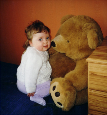 Baby picture of me with a toy bear